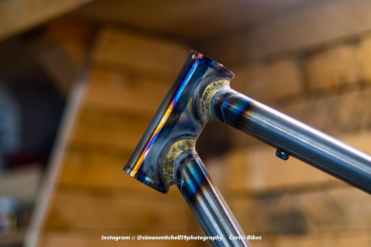 Gold fillet-brazed joints around a Curtis frame head tube